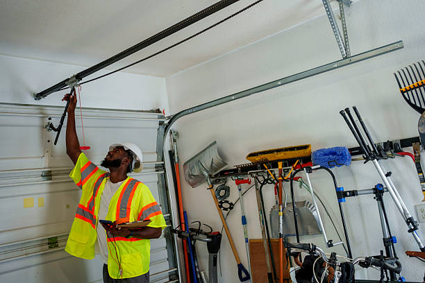 Professional Garage Door Panel Replacement technician working in Garnett, KS