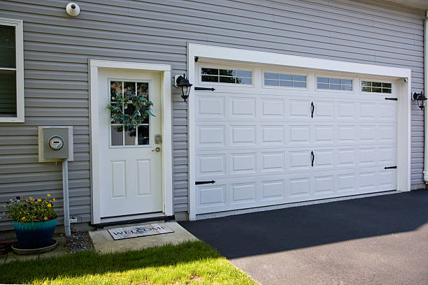 24/7 Emergency Garage Door Panel Replacement experts in Garnett, KS